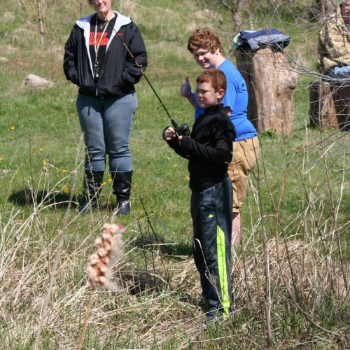 Child with a fishing pole